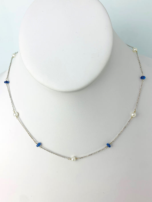 smooth blue sapphire beads alternating with round white freshwater pearls in stations around a 14k white gold chain