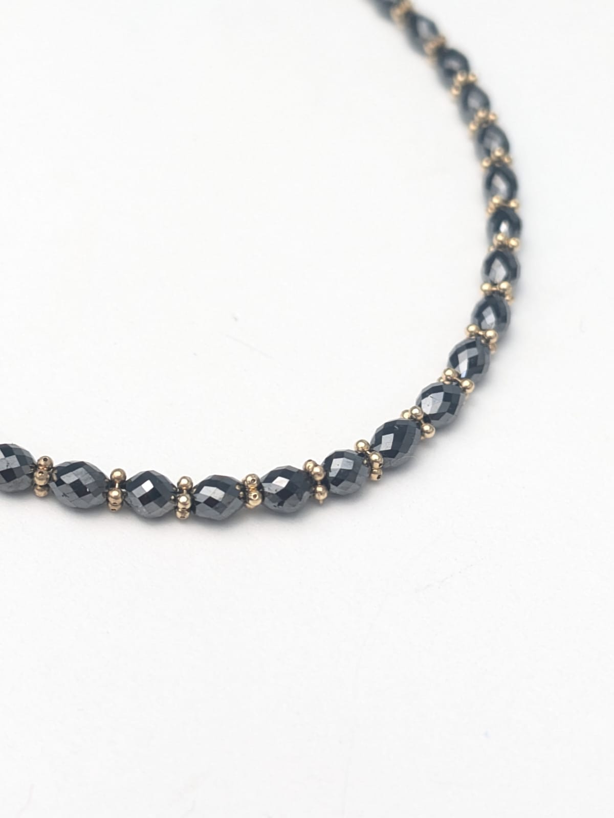Black Diamond Oval Bracelet with Rondelle Accents in 14K Gold