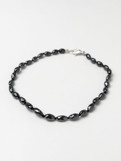 7"-7.5" Black Diamond Oval Knotted Strand Bracelet in 14KW 5.6mm X 3.2mm-7.0mm x 4.2mm bead size