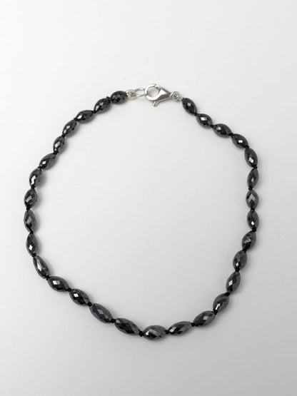 7"-7.5" Black Diamond Oval Knotted Strand Bracelet in 14KW 5.6mm X 3.2mm-7.0mm x 4.2mm bead size