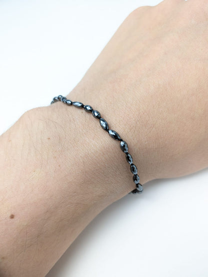 7"-7.5" Black Diamond Oval Knotted Strand Bracelet in 14KW 5.6mm X 3.2mm-7.0mm x 4.2mm bead size