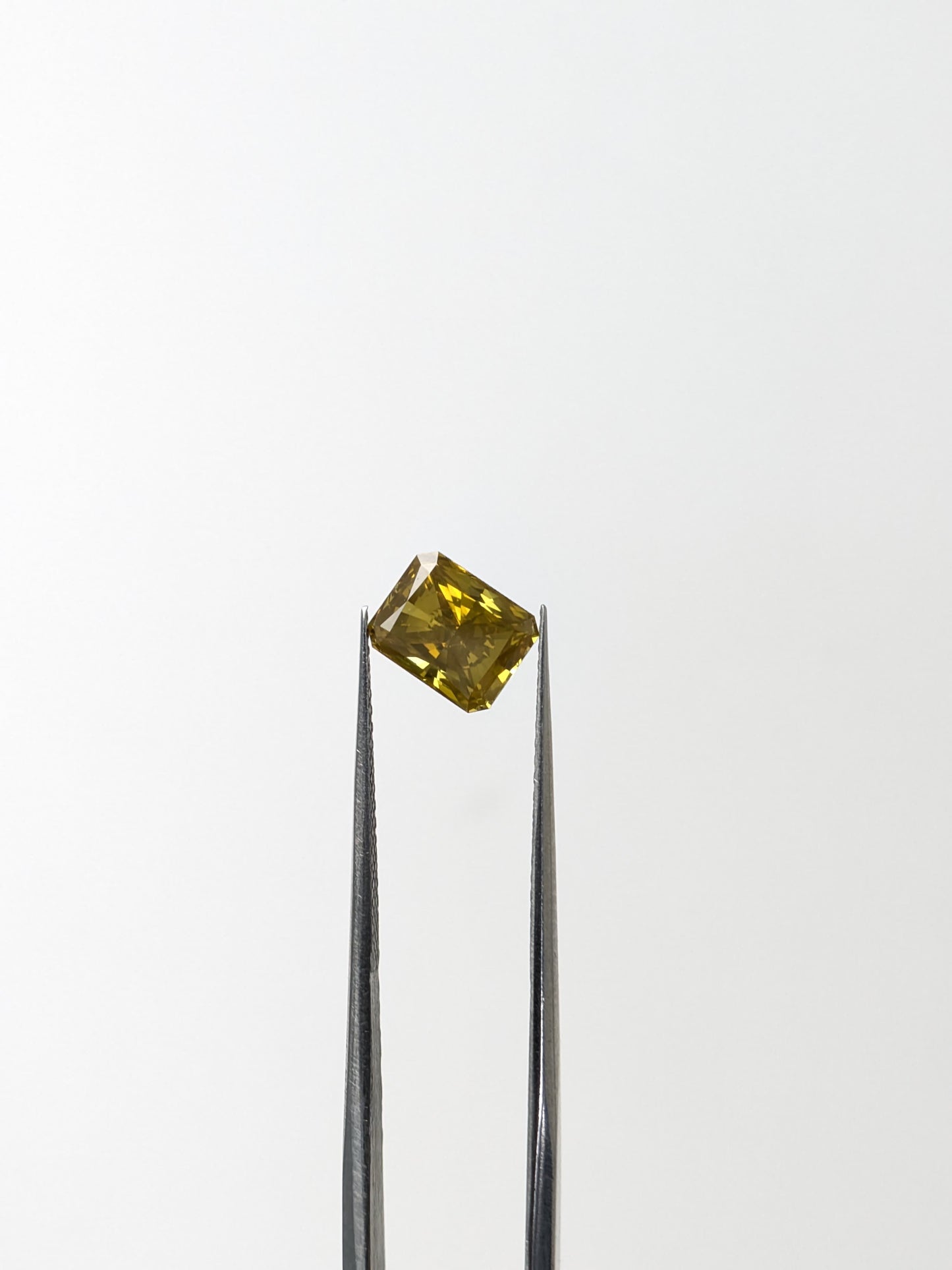CLOSEOUT - Emerald Cut Yellow Diamond Full Cut - 1.48cts - 06938